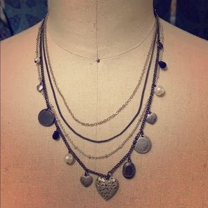 Layered necklace with charms